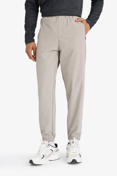 DeFactoFit Slim Fit Dar Kesim Fermuar Cepli Dokuma Sporcu Jogger