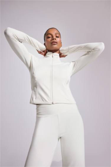 كارديجان رياضي سليم فيت بجيب بياقة عالية وبطانة ناعمة من DeFactoFit