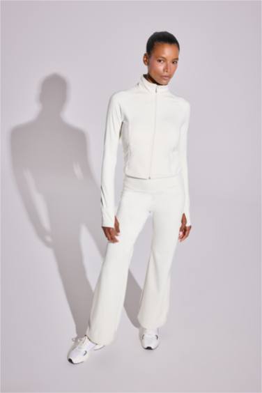 كارديجان رياضي سليم فيت بجيب بياقة عالية وبطانة ناعمة من DeFactoFit