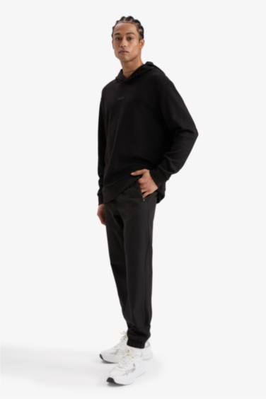 DeFactoFit Standart Fit Dokuma Sporcu Jogger