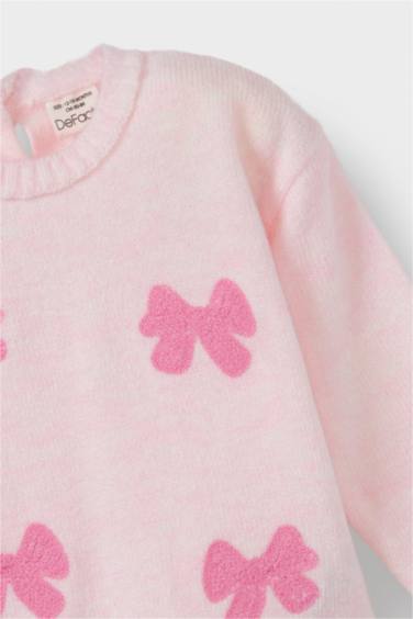 Pull en tricot col rond à motifs noeuds pour bébé fille