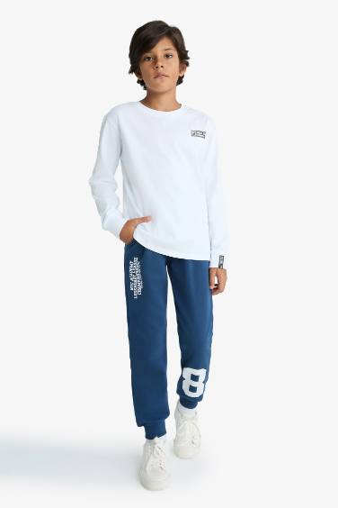 Pantalon de survêtement à taille élastique avec imprimé pour garçon