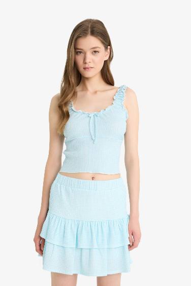 Fitted Textured Sleeveless Blouse