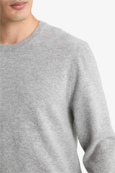 بلوز تريكو قصة عادية بياخة مستديرة