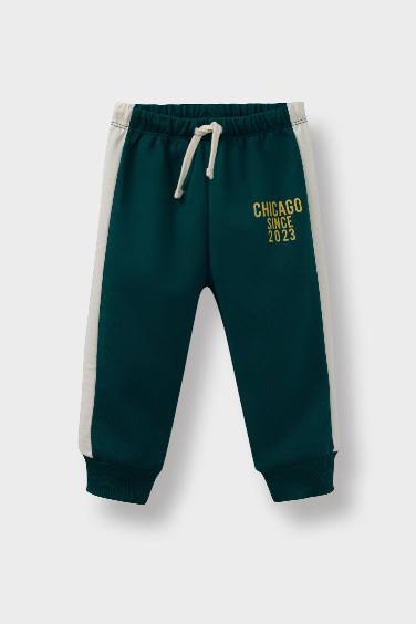 طقم بيبي اولادي سويت شيرت وسويت بانتس بطبعة شعار - قطعتين