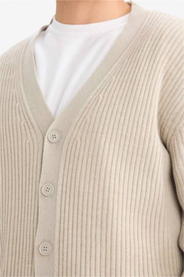 جاكيت تريكو قصة عادية بياخة V