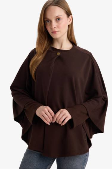 جاكيت عريض قصة عادية بياخة مستديرة