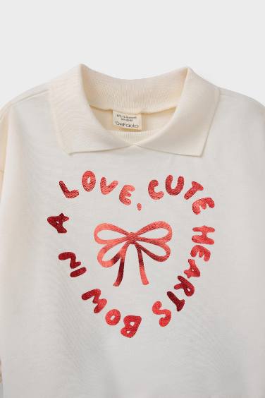 سيت بيبي بناتي بطبعة شعار قماش خفيف - قطعتين