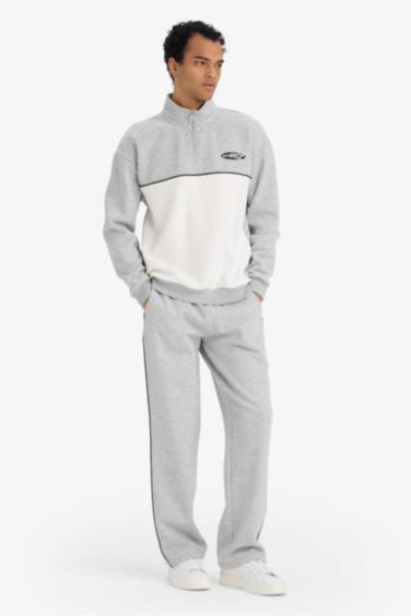 سويت شيرت تقيل بطبعة شعار اوفر سايز وياخة عالية