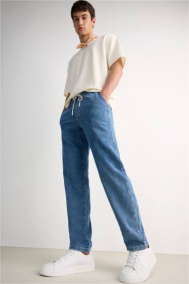 سروال جينز واسع بخصر مطاطي