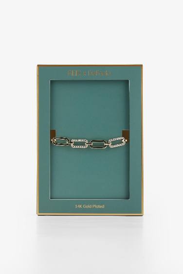 سوار نسائي ذهبي بأحجار من Reis x DeFacto