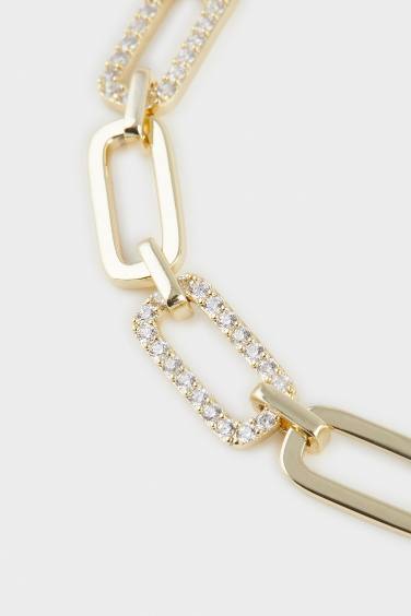 سوار نسائي ذهبي بأحجار من Reis x DeFacto