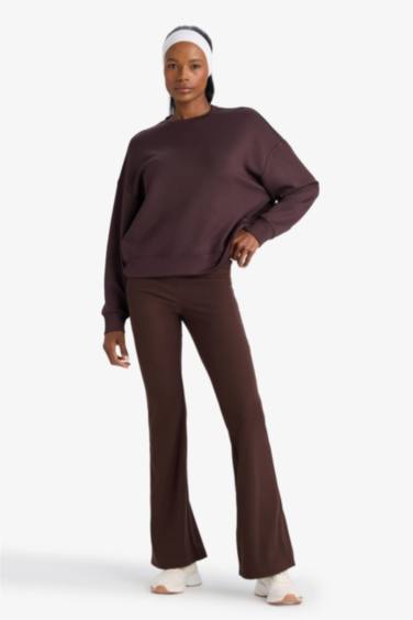 DeFactoFit Flare Fit Toparlayıcı Yüksek Bel İspanyol Paça Standart Boy Ribana Sporcu Pantolon