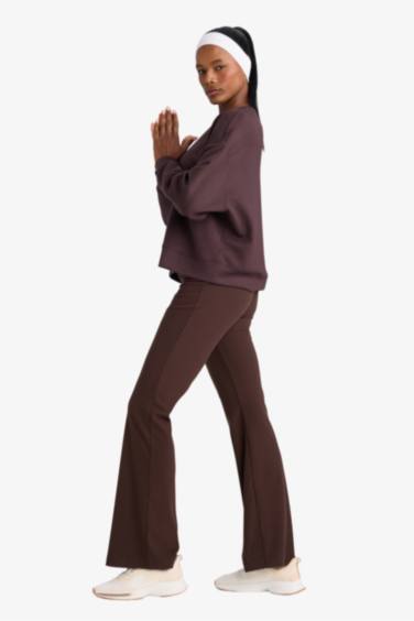 DeFactoFit Flare Fit Toparlayıcı Yüksek Bel İspanyol Paça Standart Boy Ribana Sporcu Pantolon