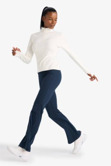 DeFactoFit Flare Fit Toparlayıcı Yüksek Bel İspanyol Paça Standart Boy Ribana Sporcu Pantolon