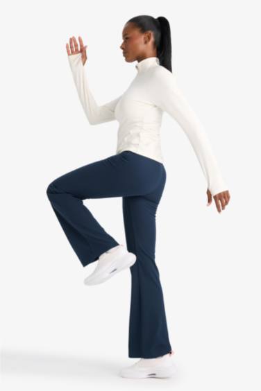 DeFactoFit Flare Fit Toparlayıcı Yüksek Bel İspanyol Paça Standart Boy Ribana Sporcu Pantolon