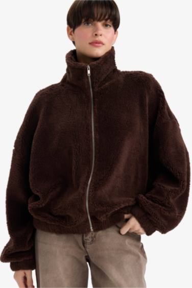 سويت شيرت اوفر سايز قطيفة فرو بياقة بولو بسوسته