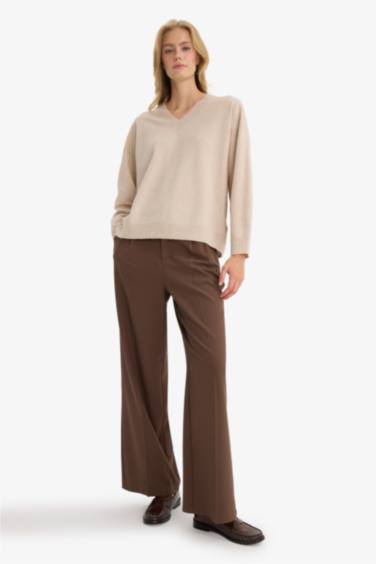 بلوز تريكو اوفر سايز بياخة مستديرة