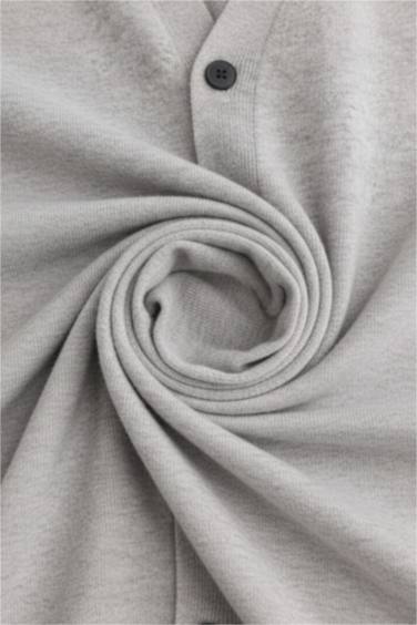 جاكيت تريكو قصة مريحة بياقة V