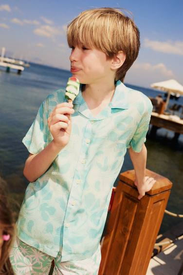 قميص بولو اولادي فلورال اوفر سايز فيسكوز