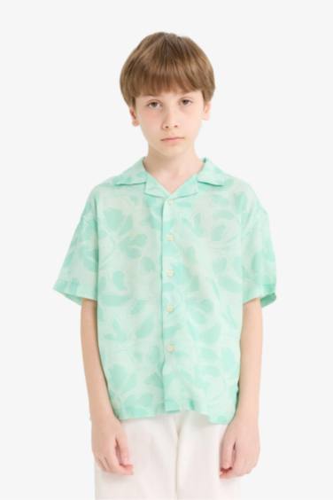 قميص بولو اولادي فلورال اوفر سايز فيسكوز