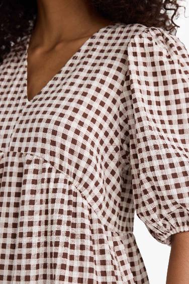 فستان ميدي كاروهات مطبوع بياخة V