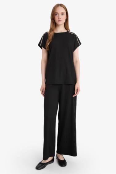 Pantalon droit en tissu froissé à taille élastique