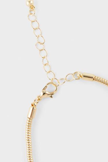 اسوار ذهبي مع تعليقات نسائي