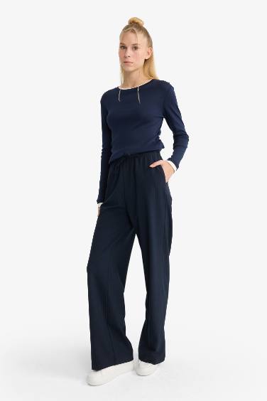 بنطرون وايد ليج برجل واسع وخصر عادي