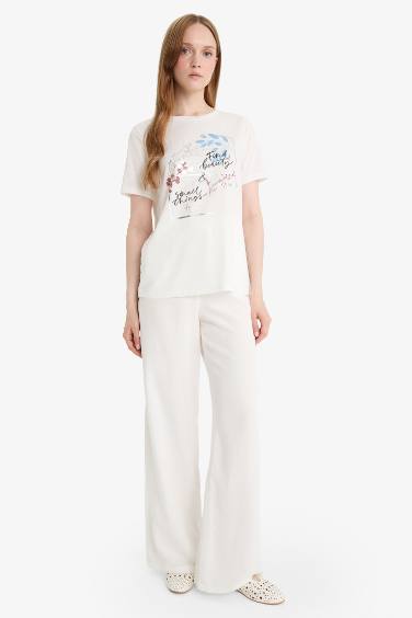 T-shirt imprimé à col rond et manches courtes Coupe régulière