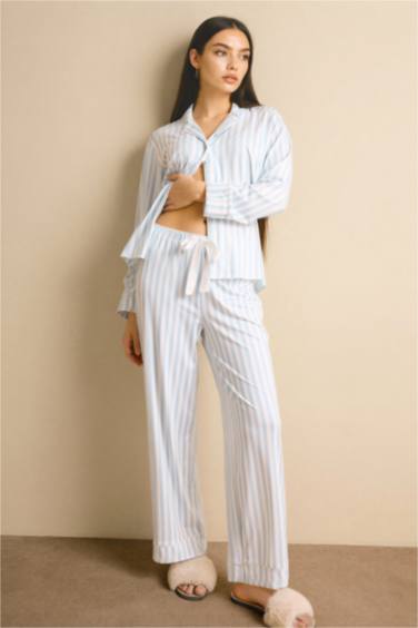 بنطلون بجامة رياضي مخطط قصة عادية