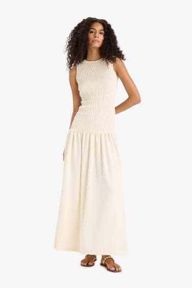 فستان طويل كت منسوج بياخة مستديرة