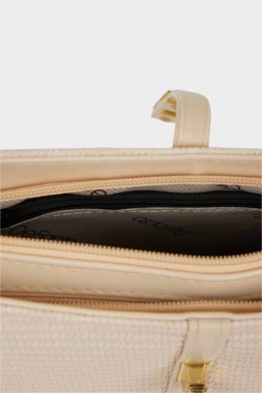 شنطة كتف حريمي بيج