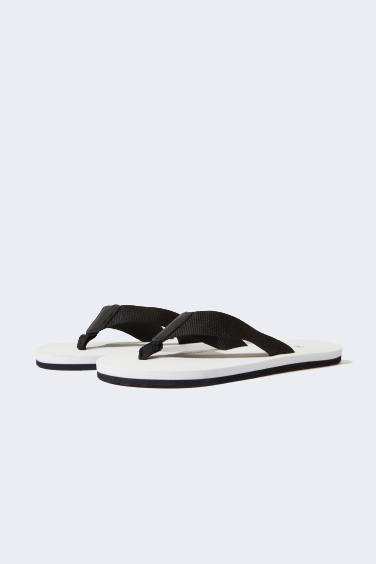 Kadın Düz Taban Parmak Arası Terlik