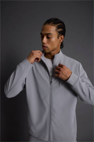 كارديجان قصة عادية بياقة عالية بجيب فليتو