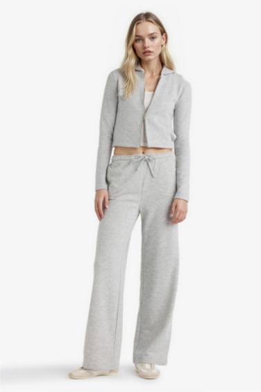 جاكيت رياضي منسوج سليم فيت بغطاء للرأس