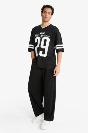 Pantalon droit large à poches Coupe barrel