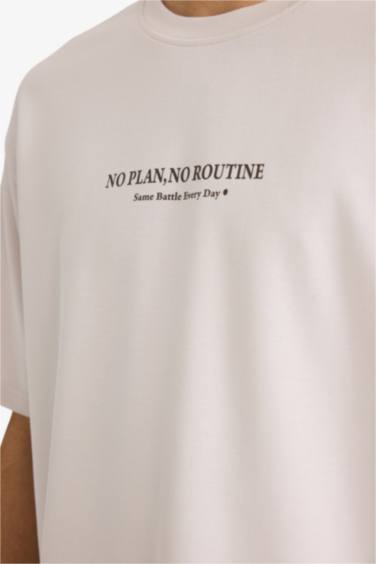 تيشيرت نص كم أوفر سايز برقبة مستديرة