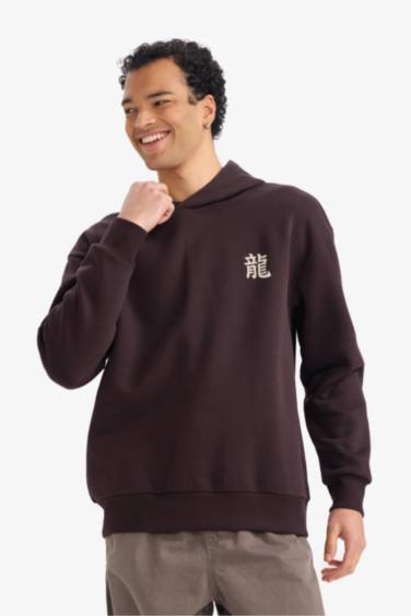 سويت شيرت مطبوع أوفر سايز بغطاء للرأس