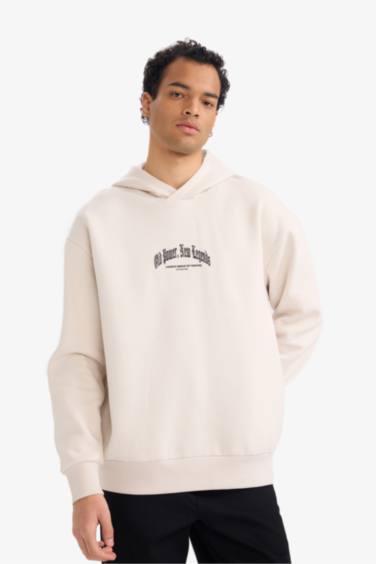 سويت شيرت مطبوع أوفر سايز بغطاء للرأس