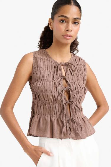 Slim Fit Crew Neck Tie Front Sleeveless Blouse