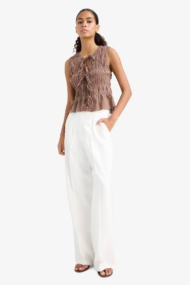 Slim Fit Crew Neck Tie Front Sleeveless Blouse