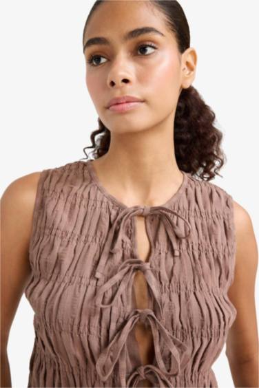 Slim Fit Crew Neck Tie Front Sleeveless Blouse