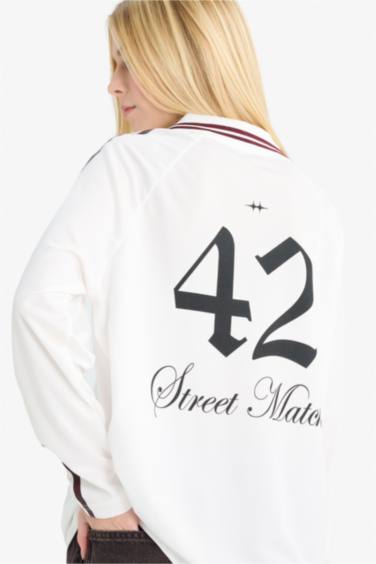 تيشيرت اوفر سايز كم طويل بياقة بولو