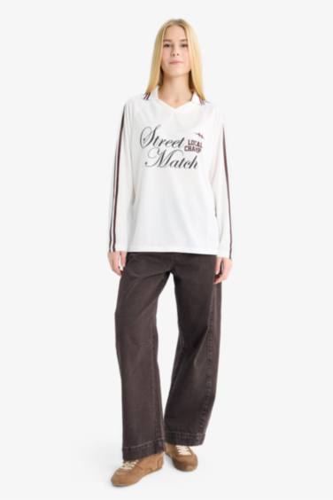 تيشيرت اوفر سايز كم طويل بياقة بولو