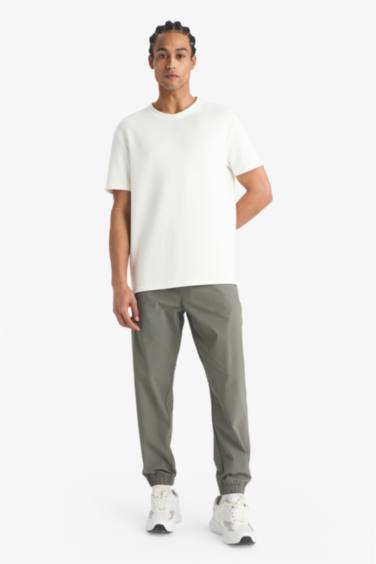 سروال رياضي منسوج سليم فيت