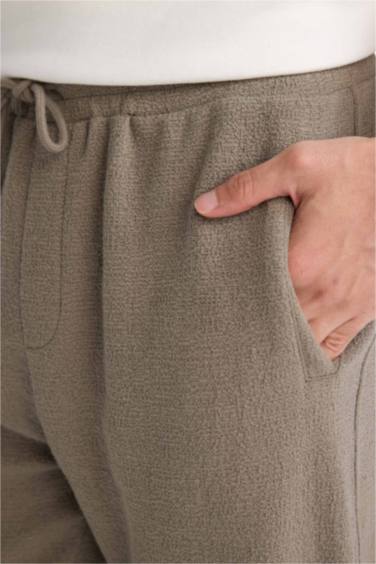 بنطلون قصة عادية وخصر برباط