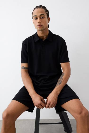 تيشيرت بولو رياضي منسوج قصة عادية من DeFactoFit