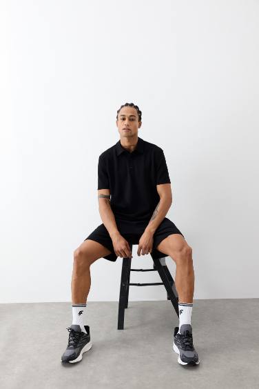 تيشيرت بولو رياضي منسوج قصة عادية من DeFactoFit