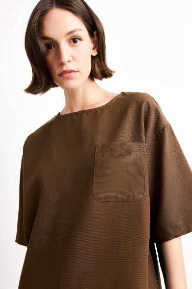 بلوزة نص ردن منسوج قصة مريحة بياخة مستديرة